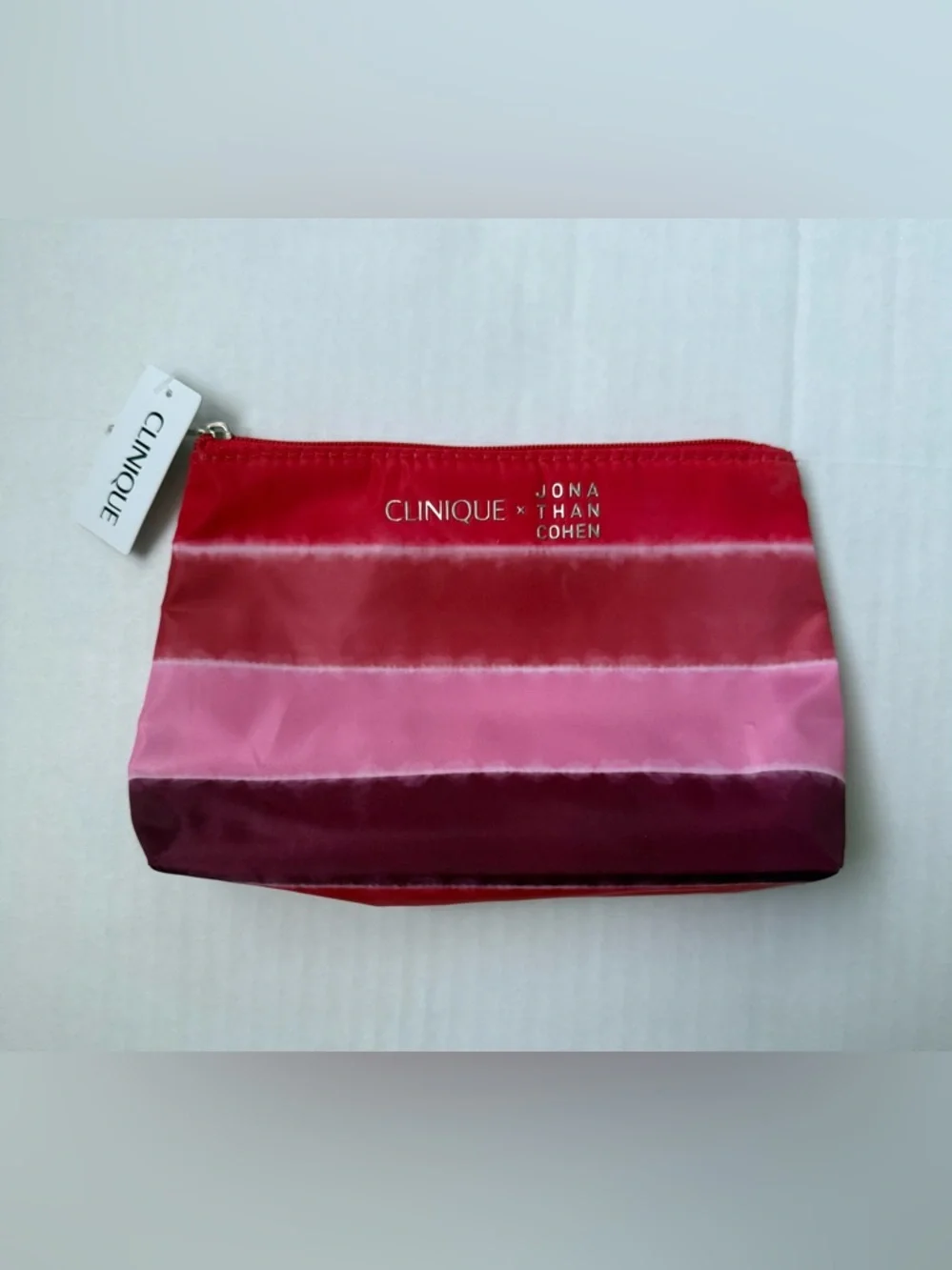 Clinique x Jonathan Cohen Zip Top Cosmetic Bag Red to Pink Ombre Striped
